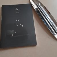 Quaderno segno leone e porta matite Elisse ALESSI