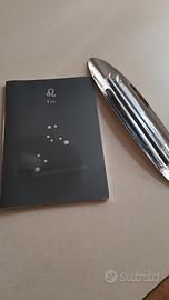 Quaderno segno leone e porta matite Elisse ALESSI