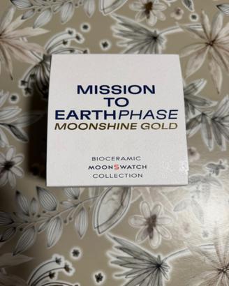 OROLOGIO MOONSWATCH - MISSION TO EARTHPHASE
