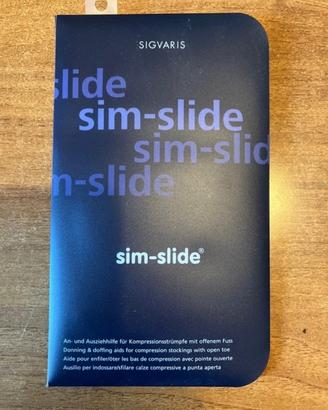 Ausilio per indossare/sfilare calze compressive