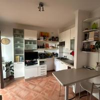 Bilocale con terrazzo e box auto