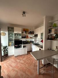 Bilocale con terrazzo e box auto