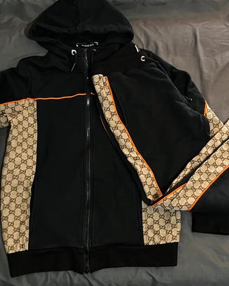 tuta lunga gucci