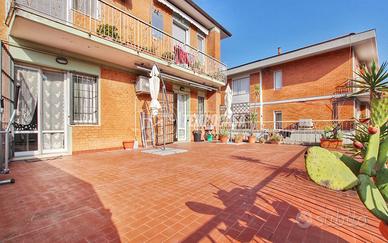 APPARTAMENTO CON AMPIO TERRAZZO E POSTO AUTO