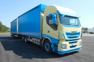 Iveco AS260S48 con rimorchio biga