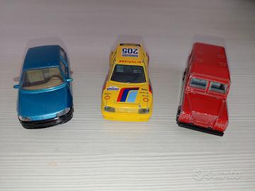 Fiat Punto Peugeot 205 Land Rover 1/43 Burago 