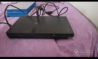 ps2 slim con jostick + 2 memori card ps2+3 giochi 