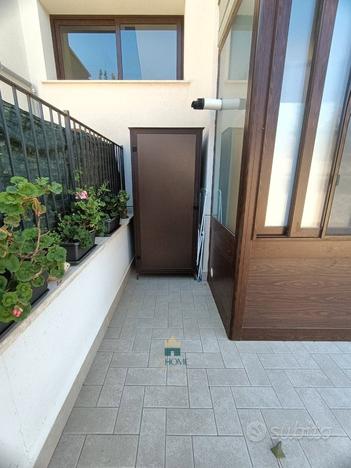 Moderno trilocale con giardino privato+posto auto