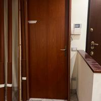 2 porte battenti in noce  + 2 porte scorrevoli con