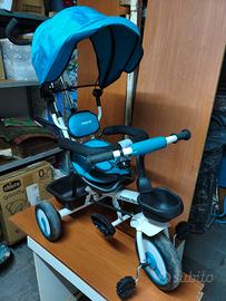 Triciclo evolutivo Fascol con maniglione e cappott