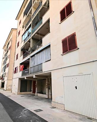 Appartamento con Garage soffitta e posto auto