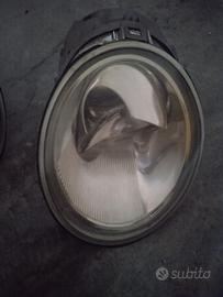 ricambi new beetle 99, fari frecce , consolle ,