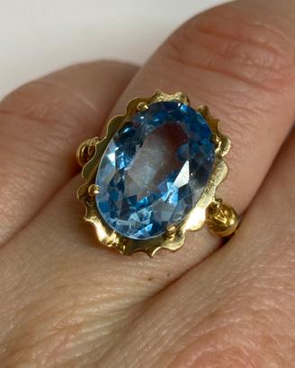 Anello oro giallo 18kt e topazio azzurro