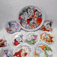 Set Completo di Piatti dei Sette Nani Disney.
