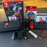 Nintendo Switch Oled scarlatto e violetto