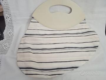 Borsetta a mano in stoffa e plastica 