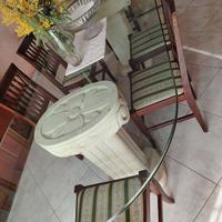 Tavolo in cristallo gambe in pietra Leccese