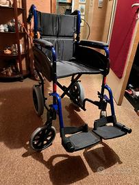 Carrozzina - sedia a rotelle