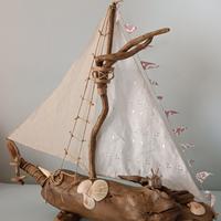 Veliero con legno di mare