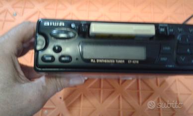 Autoradio Stereo-Cassette AIWA. Frontalino estraib