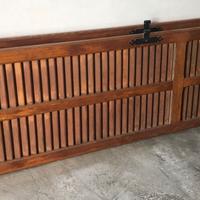 Porte persiane in legno con serramenti