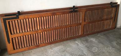 Porte persiane in legno con serramenti