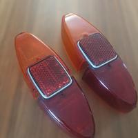 plastiche fari posteriori F1100