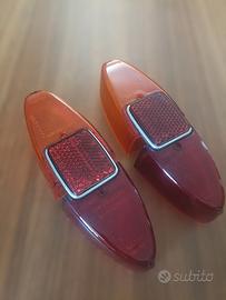 plastiche fari posteriori F1100