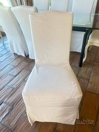 Sedie con copertura lunga bianche