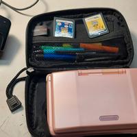 Nintendo DS con scheda N5 Revolution, case, giochi