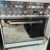 cucina ariston hotpoint a 5 fuochi con girarrosto 