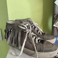 Sneakers in pelle con frange