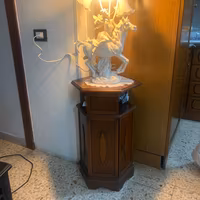 angoliera con abat-jour con a capo di monte