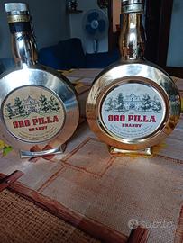 2 bottiglie di oro pilla piene