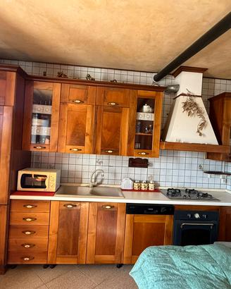 Camera da letto con cucina e immobili