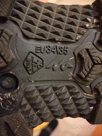 Tuta da sci e scarponcini doposci bambino