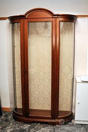 Vetrina ad un'anta con fianchi in vetro curvato