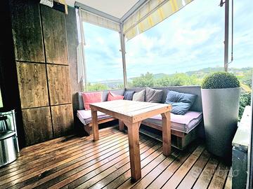 Divanetti e tavolo bancali con cuscini