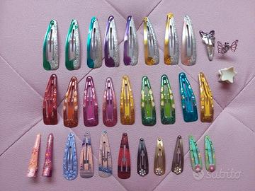 Lotto di 31 fermagli per capelli