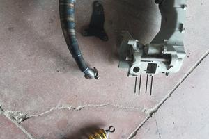 carter e ammortizzatore f12 e scarico giannelli 
