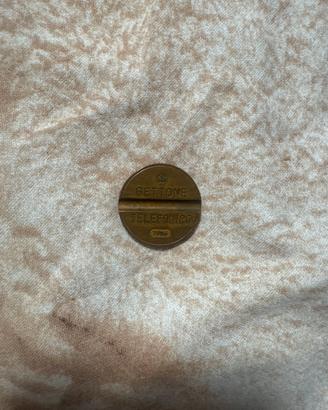 Gettone telefonico 7906