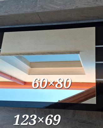 Specchiera con cornice nera laccata