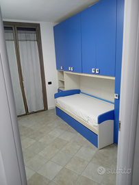 Camera singola in condivisione