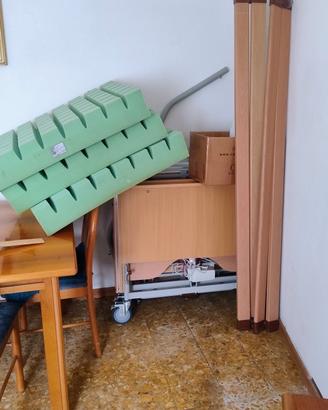 letto motorizzato con sponde