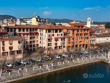 Fronte fiume , attico di mq.170 oltre sottotetto