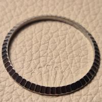 Lunetta "engine turned" Rolex 16220