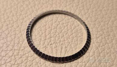 Lunetta "engine turned" Rolex 16220