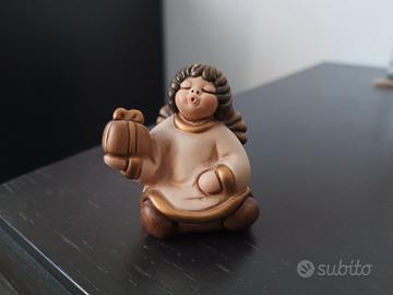 angelo con dono thun