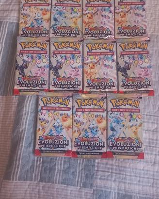 11 bustine booster sealed Evoluzioni Prismatiche