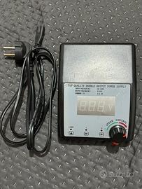 Macchinetta per tatuaggi + alimentatore + aghi